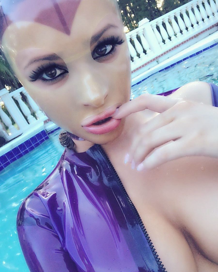 carrielachance:  What do you guys think of me in a latex hood? This is my first time