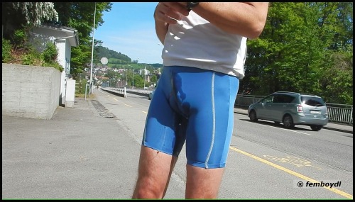 XXX femboydl:  pee break in shiny spandex shorts photo