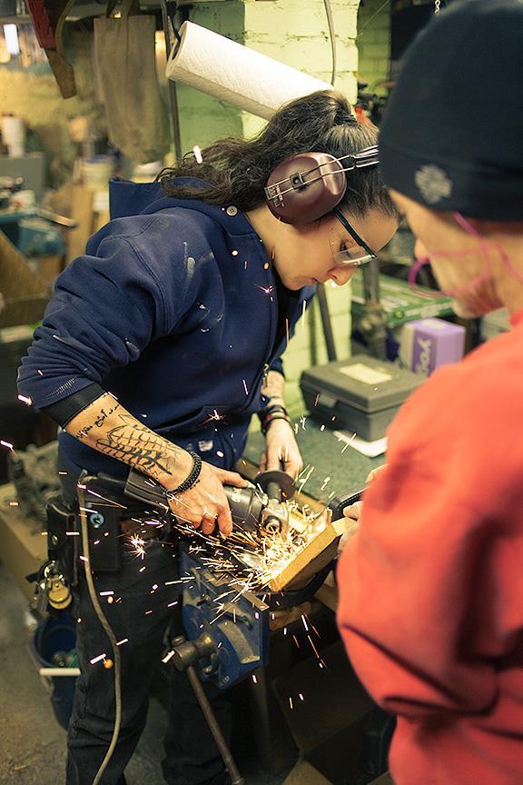 motolady:  J Shia co-owner and mechanic at Madhouse Motors Cambridge, MA- cutting