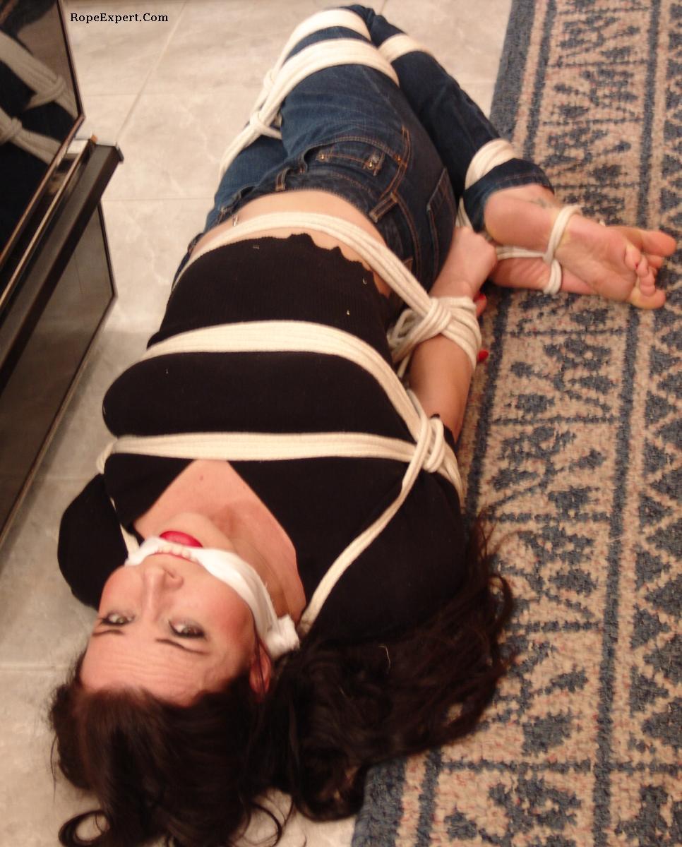 zippo077:  Bound and gagged by a burglar,a terrified Lucy cowered on the floor of