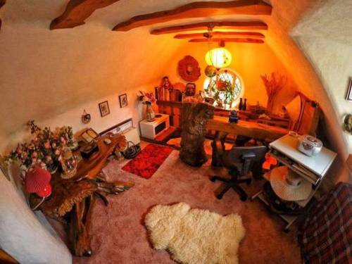 voiceofnature:  Whimsical hobbit house built by Stuart Grant. Located near Tomich, Scotland, he constructed his own real-life Hobbit house with a magical-looking outside and impressive interior. Built in the 1980s, the exterior of the home is completely