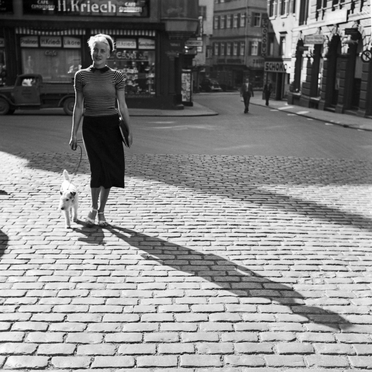 Lady Walking Dog at Cafe Kriech, 1935. Karl Lammel. Silver print.