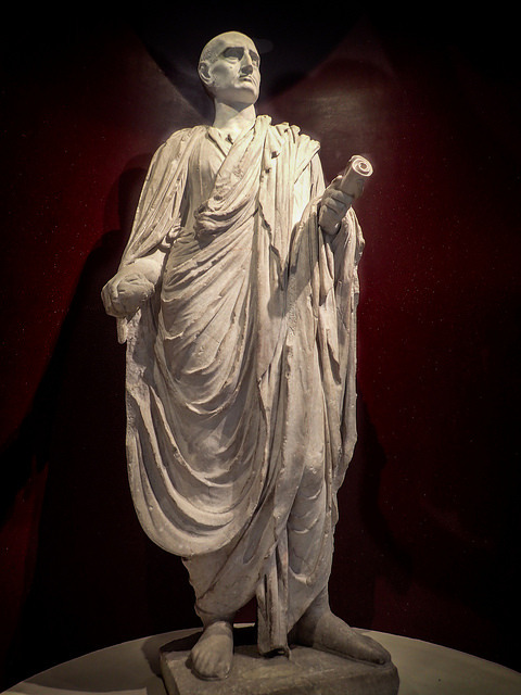 Roman statue of a man wearing a toga by mharrsch on Flickr.