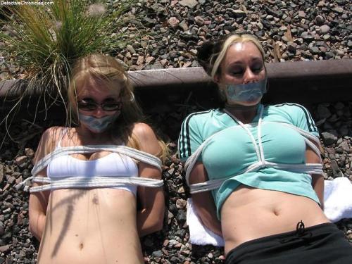mmpphhmmpphh:Jill and Suzette tied up on the railroad tracks