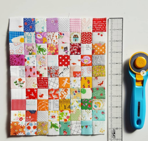 Tiny rainbow patchwork block by rosie.taylor.crafts on Instagram