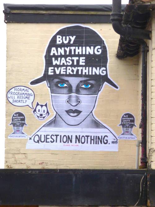 “Buy Anything, Waste Everything, Question Nothing”Pasteups by ‘Slave Nation’ in London