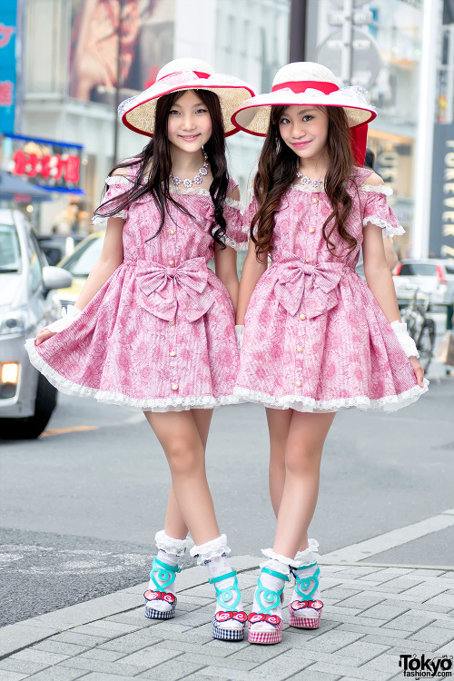 Ayaka and Kirari on the street in Harajuku today wearing matching summer looks - featuring straw hat