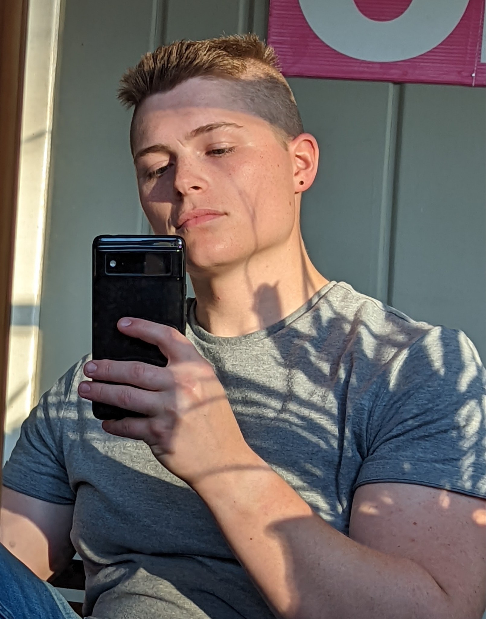 that-stone-butch:stuck working 🙄 on butch appreciation day so please enjoy this semi recycled jawline selfie he/him (butch lesbian)