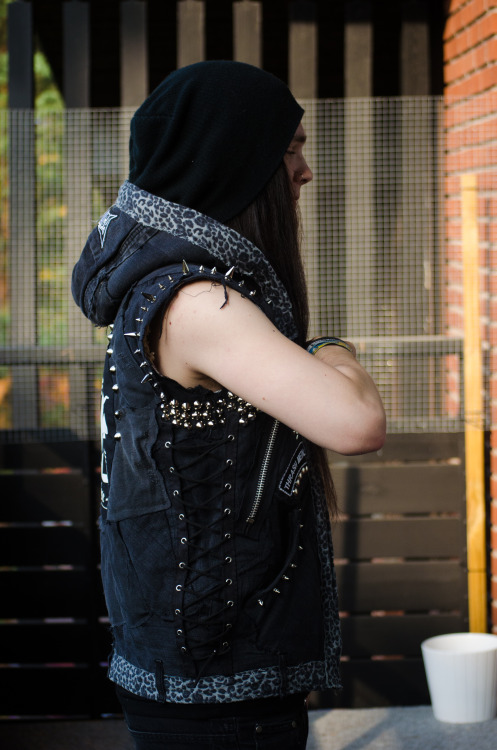 bloodyqueefs:  bazaton:  This unique vest is made of an old hoodie with fluffy lining, (sleeves cut off). Then I took an old pair of black jeans and cut into pieces, then sewed the pieces to the hoodie.And ofc I added all the studs, patches and so on