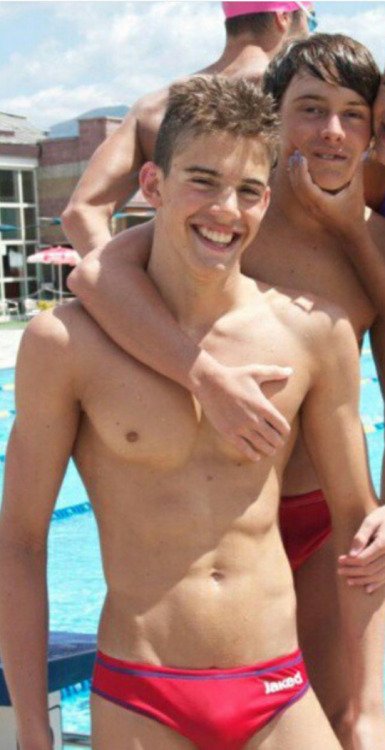 sfswimfan: This cute swimmer twink’s Jaked Milanos just got a little tighter with his friend’s hand 