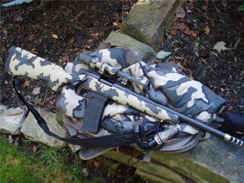 gunrunnerhell: Remington 700 Custom built 700 by Breakneck Creek Precision Rifle Co (BNCP). This is chambered in .458 SOCOM, hence the AR-15 magazine adapter. Generally .458 SOCOM is a heavy hard hitting but short range caliber for the AR platform, a