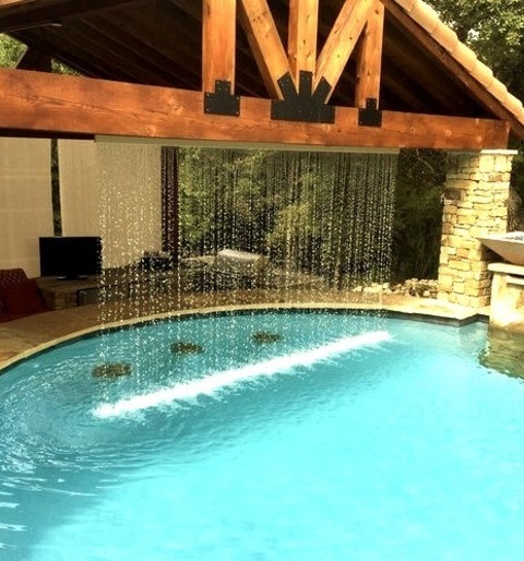 Austin InfinityPhoto Of A Large, Custom-designed Infinity Hot Tub In A Backyard With Mountains