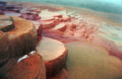 travelingcolors:    Badab e Surt | Iran (by Mojtaba Shadman Rad)This beautiful red like mineral spring is located between Semnan and Sari near a village which is named Malkhast. These beautiful colors are because of several different mineral salts like