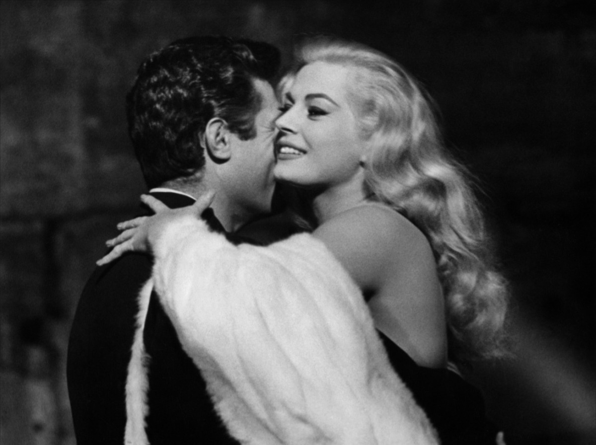 gatabella:  Anita Ekberg and Marcello Mastroianni on the set of La Dolce Vita, 1960