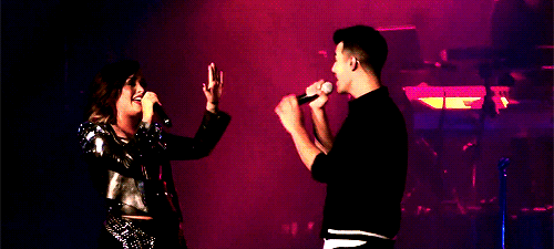 burrowjoe:  Demi Lovato and Joe Jonas reuniting onstage for the first time together since 2010 to perform “This is Me” at the Staples Center in Los Angeles, California - September 27, 2014. 