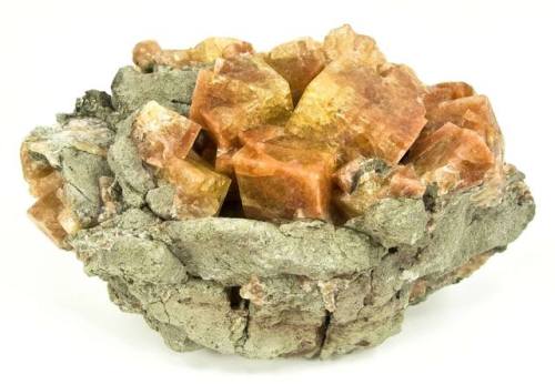 ChabaziteA large family of minerals known as zeolites tends to form in the bubbles in lava after it 