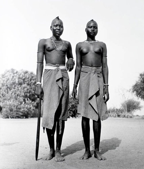 hushaby:  Tribal Portraits: Vintage & Contemporary Photographs from the African Continent | Science | The Guardian   African Dinka girls, by George Rodger, 1948. The Dinka are Sudanese tribespeople who rely on cattle herding at riverside camps in