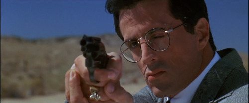 snapshot-cinema:Tango &amp; Cash (1989)Dir: Andrey Konchalovskiy &amp; Albert MagnoliDP: Donald E. T