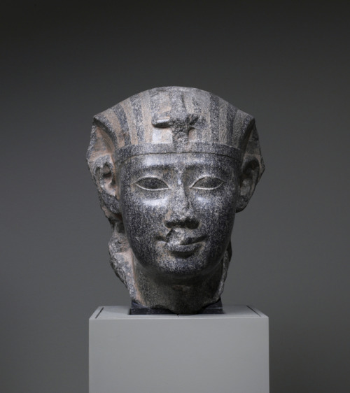 Granite head of Ptolemy II Philadelphus (r. 283-246 BCE), represented as a traditional Egyptian phar
