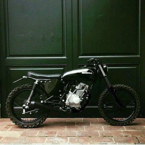 garageprojectmotorcycles: Saw this with white pipe wrap and bare forks so painted it black to see wh
