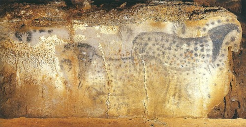 Horse painting and hand stencils, Pech Merle caves, France. Charcoal residue from the horse on the r