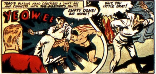 early 1940s hero brawl: in a crippled U-boat amid gangs of clobbered Nazis, Toro slaps Namor’s