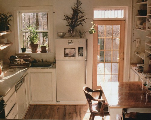 vintagehomecollection: Opening up the kitchen. Open shelves and a glazed door to the backyard deck g