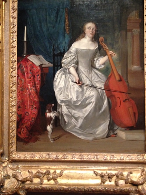 This lady is sooo over that diva of a dog Lady with a viola de gamba by Gabriel Metsu 1663