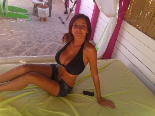 Honey, tell the surfer guys I met this morning that I’m back and I’m going to sunbathe in the nude….I’ll need help with the suntan lotion if they’re willing to lend a hand…Some places I just can’t reach!…