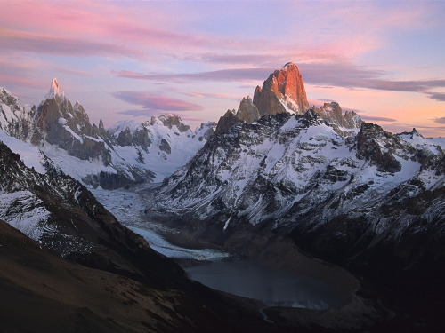 Dawn breaks over the granite spires of Patagonia&rsquo;s Cerro Torre massif (left) and Mount Fit