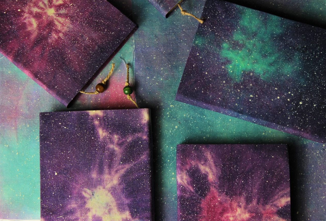 rollingpenguin: sosuperawesome:  Handmade Batik Fabric Cosmos Journals and Notebooks