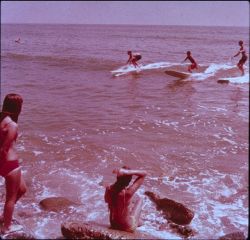 westside-historic:  Surfing in Santa Monica in 1975. Source: smpl.org 