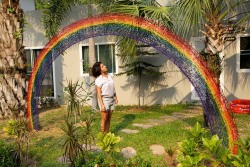 mymodernmet:  Protected Paradise by Ole Ukena A large, 3-foot wide rainbow made out of an arching series of colorful barbed wire.