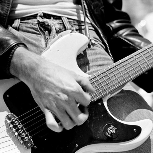 vaticanrust:  Johnny Ramone and his guitar, circa 1970s.  Photo by Michael Jang.