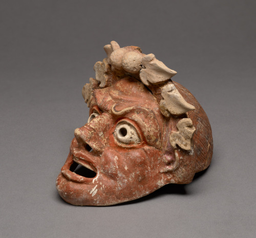 theancientwayoflife:  ~Mask of a Satyr. Culture: Greek (Sicilian) Place of origin: Sicily, Italy Date: 200 - 100 B.C. Medium: Terracotta with polychromy (brownish red, orange red, white, black, pink, sky blue) 