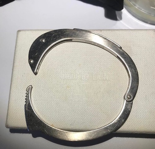 chromet:Helmut Lang handcuff bracelet Via emilwaede