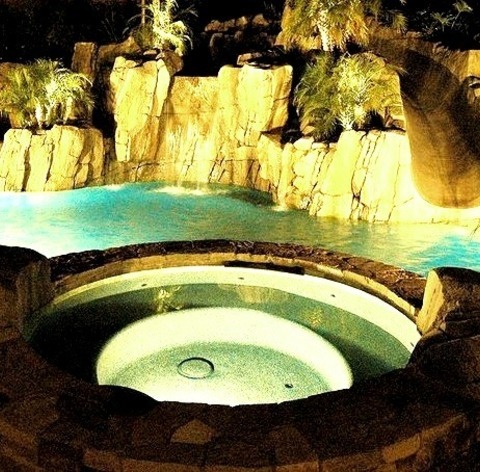 Tropical Pool Orange CountyInspiration For A Mid-sized Tropical Backyard Custom-shaped Natural Pool Fountain