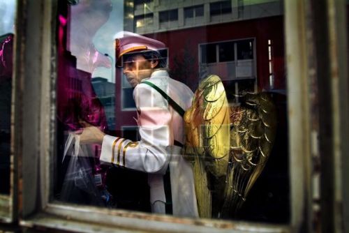 Photo of the Day: A Belgian AngelPhotographer caption: A man is going home after attending the 