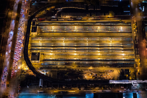 flavorwire:  Breathtaking Neon-Tinged Aerial Shots of New York City at Night
