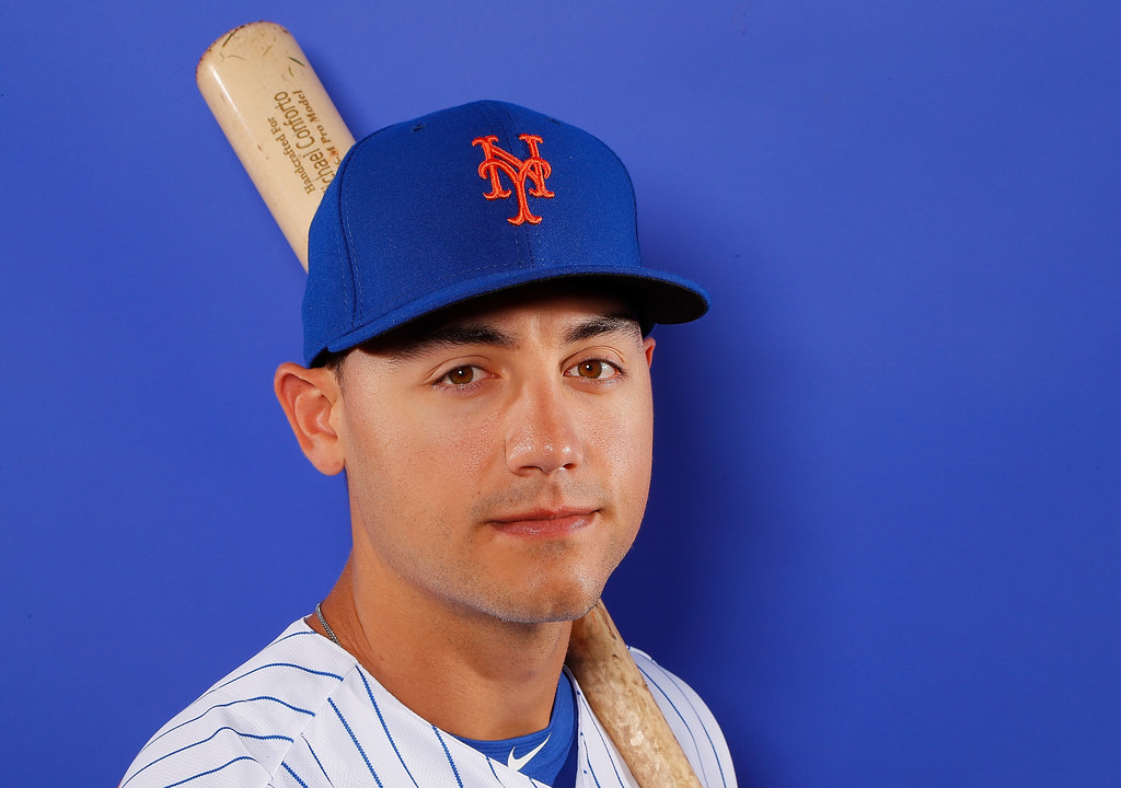 harveydegrom:Michael Conforto of the New York Mets poses during photo day at First