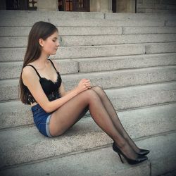 razumichin2:  Denim shorts, black top, tights and high heels