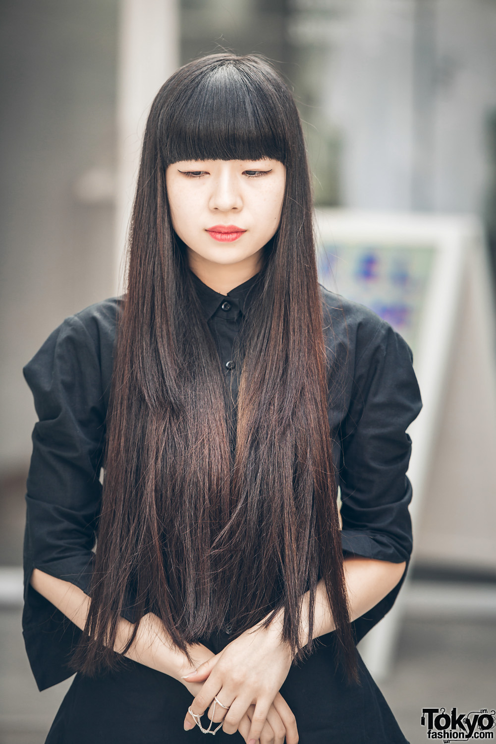 Ryoka on the street in Nakameguro wearing a dark minimalist look with ...