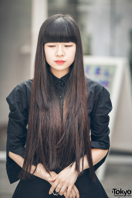 Ryoka on the street in Nakameguro wearing a dark minimalist look with fashion by Yohji Yamamoto and 