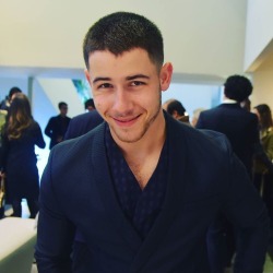 jobrosnews:luke_leitch: Fresh off the jet from a golf trip to Hawaii, Nick Jonas at Emporio Armani. #nickjonas #mfw #armani #voguerunway