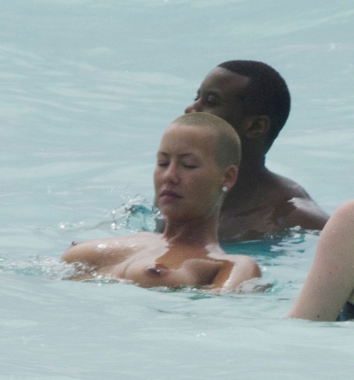 toplessbeachcelebs:  Amber Rose (Model) swimming porn pictures