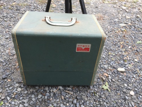 thislifeintransit:  so I’ve been cleaning up the garage(originally in effort to make room to fix my car but ended up slowly going for an entire reorganization.   in my travels I came across an old slide projector. it belonged to sorel’s grandmother’s