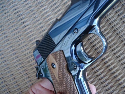 whiskeyandspentbrass:  Colt Royal Blue. You send send them your gun and they will give it this treatment if you ask really nicely. 