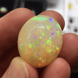 oathgrowth: fullten:  fruitstim:  opal  This rock looks like it’s glitching   it looks like the doppler radar on my local news during a storm 