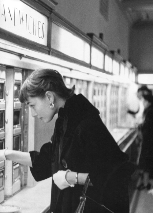 ladybegood:Audrey Hepburn photographed by Lawrence Fried inside the Horn and Hardart automat, 1952