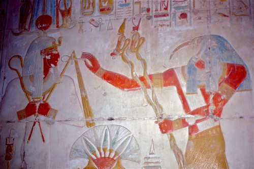 The 19th Dynasty pharaoh Seti I (r. ca. 1294-1279 BCE) receives the ankh (symbol of life) from the g